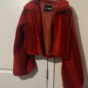 Red cropped jacket , Brand new tags just got taken off .
